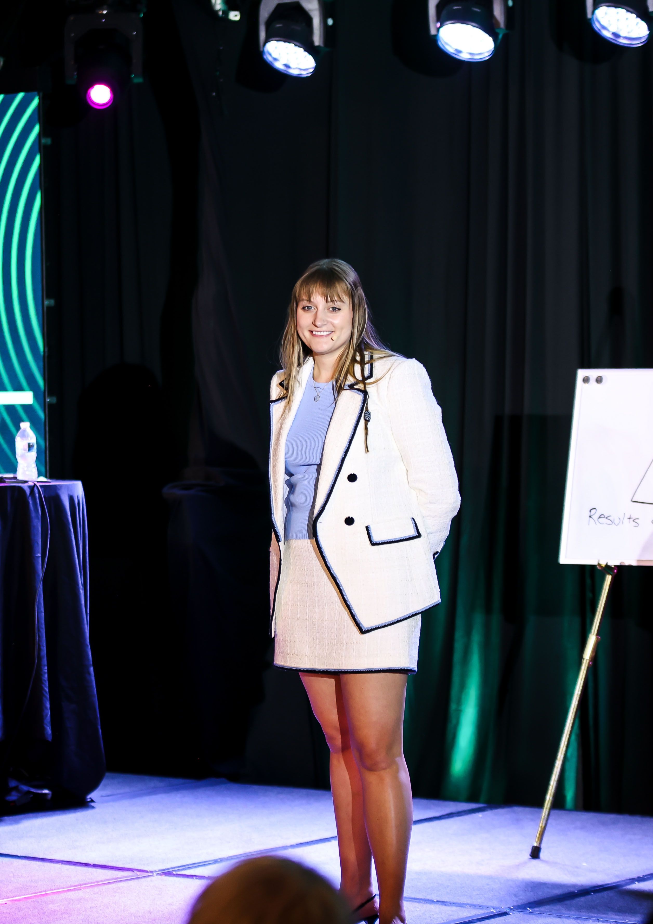 Hannah Kesler smiling on stage